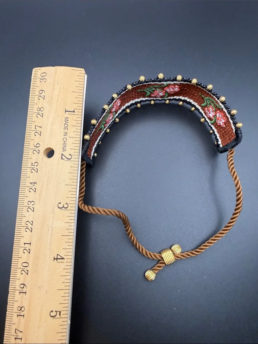 Tory Burch Rust Brown Embroidered Floral Rope Bracelet with Gold Logo